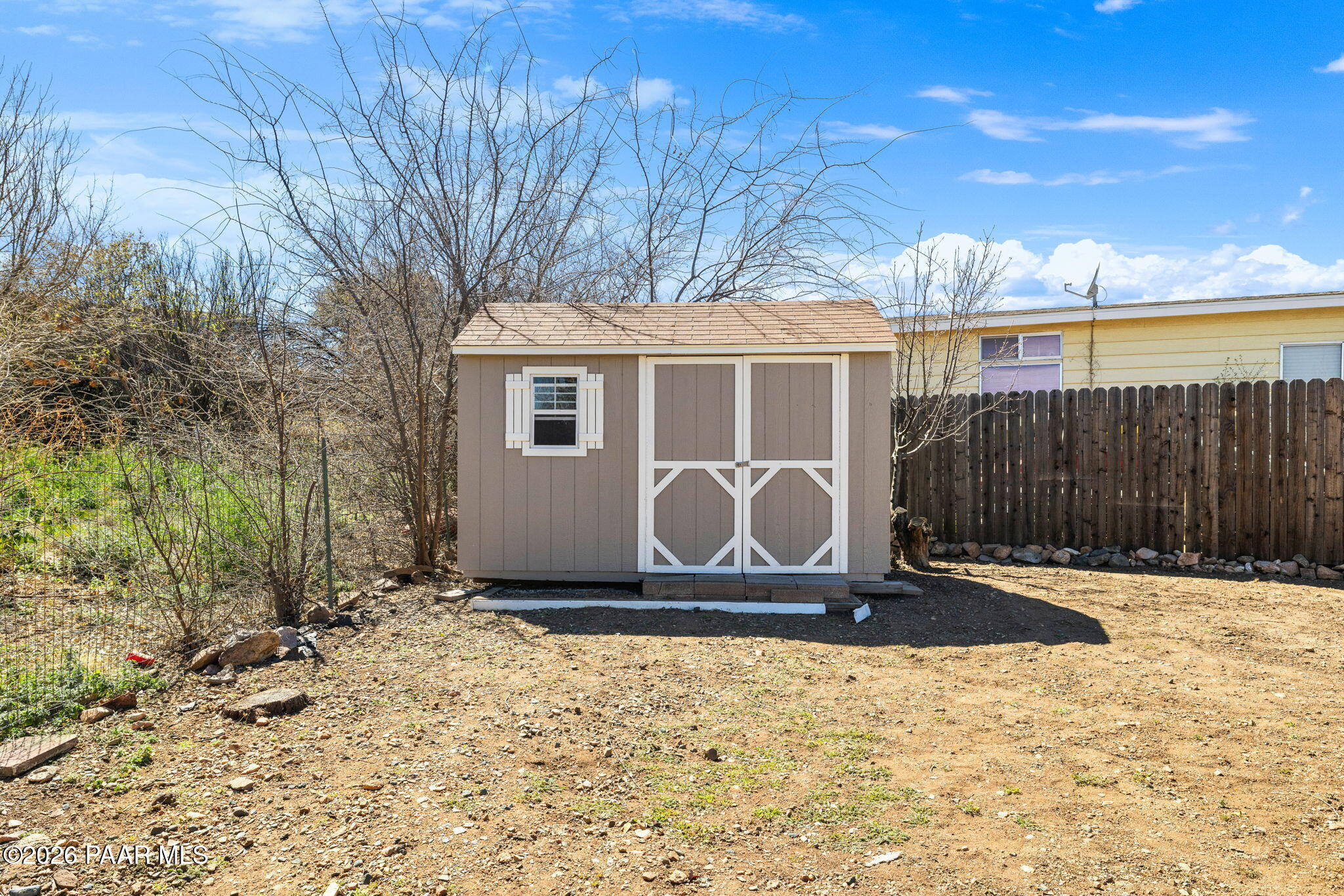 10397 East Durham Road Dewey, AZ 86327 - Photo 34 of 40 a front view of a house with a yard