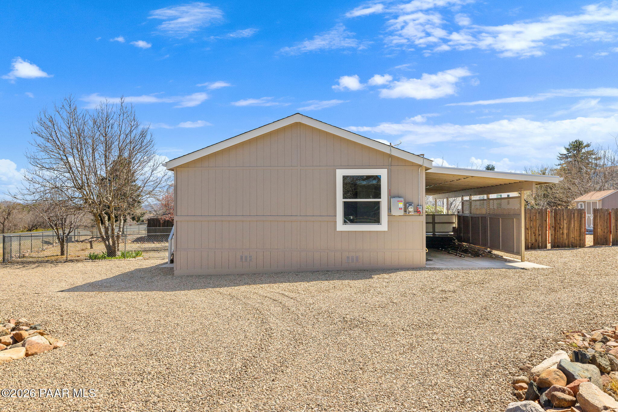 10397 East Durham Road Dewey, AZ 86327 - Photo 35 of 40 a front view of house with yard covered in snow