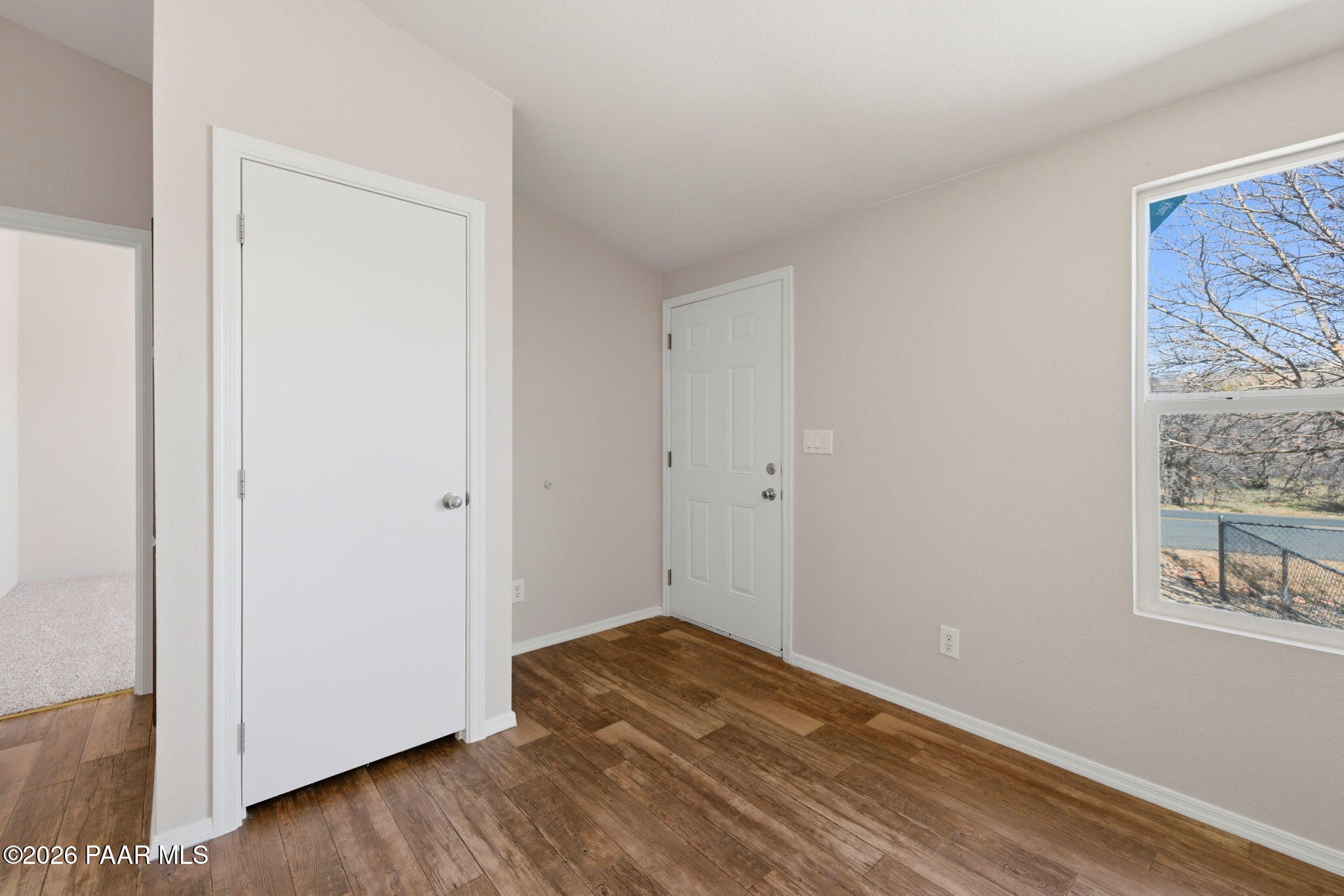10397 East Durham Road Dewey, AZ 86327 - Photo 10 of 40 a view of a room with wooden floor and a window