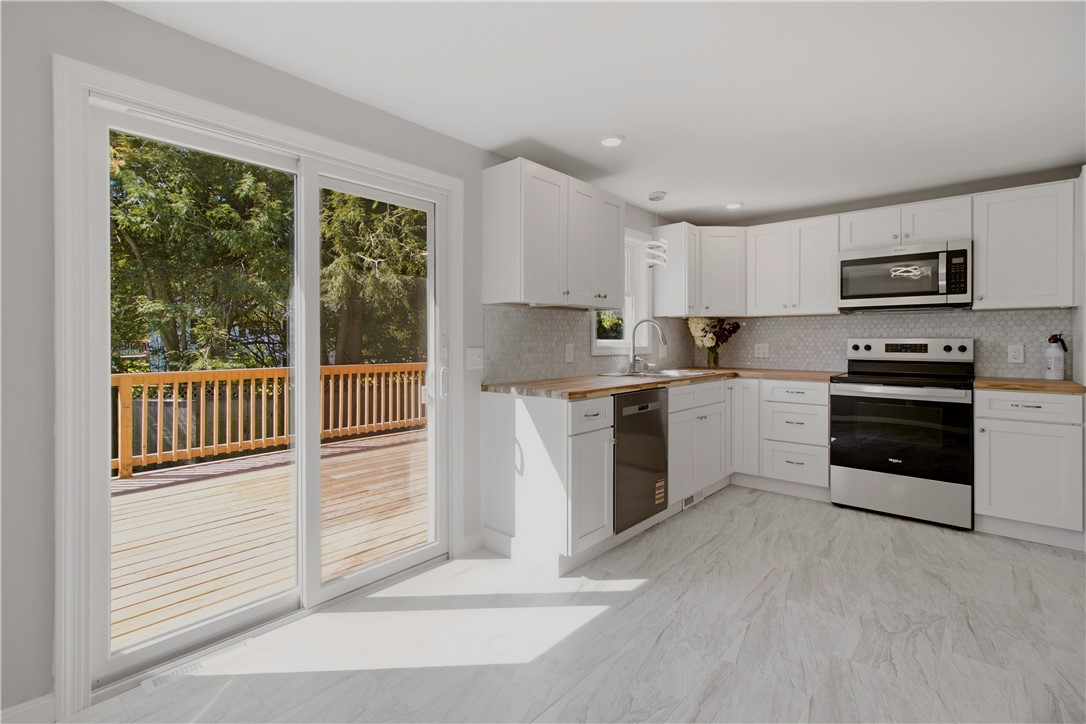 174 Ten Rod Road Exeter, RI 02822 - Photo 11 of 41 Kitchen out to deck