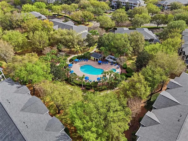 a view of a garden with a building