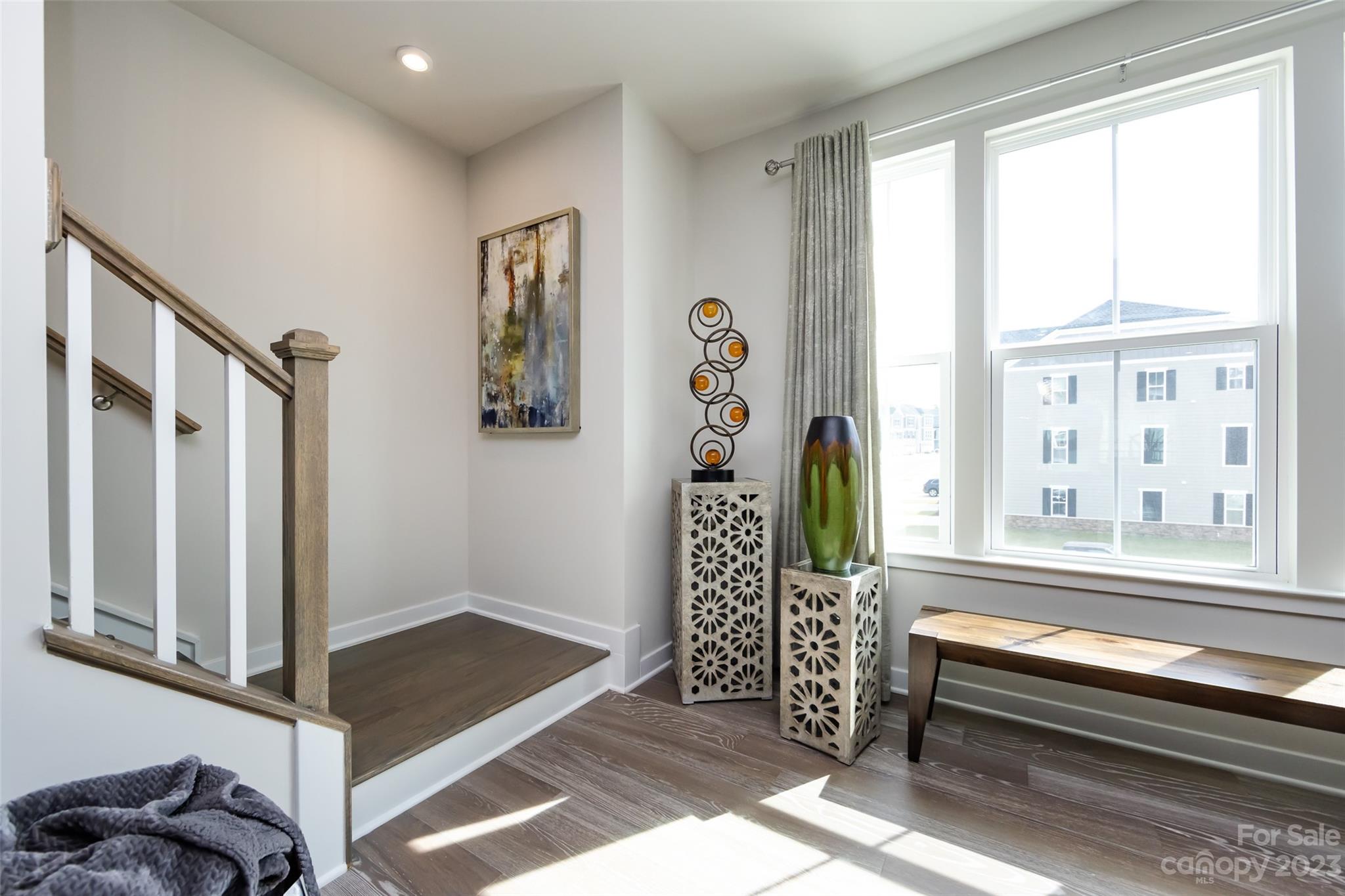 606 Crudent Road Tega Cay, SC 29708 - Photo 24 of 47 a living room with furniture and a window