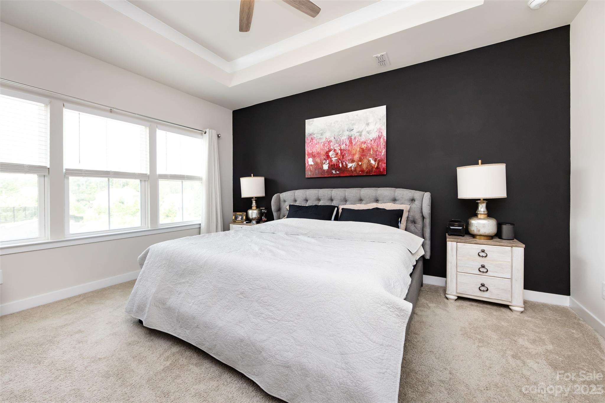 606 Crudent Road Tega Cay, SC 29708 - Photo 25 of 47 a bedroom with a bed and a flat screen tv