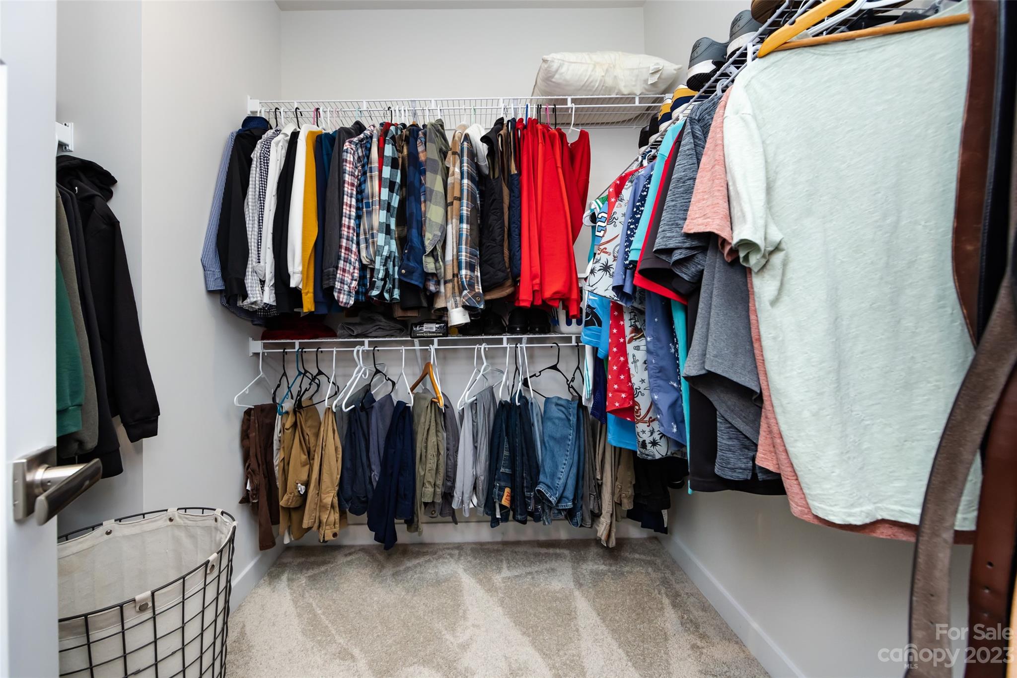 606 Crudent Road Tega Cay, SC 29708 - Photo 27 of 47 a view of walk in closet with clothes