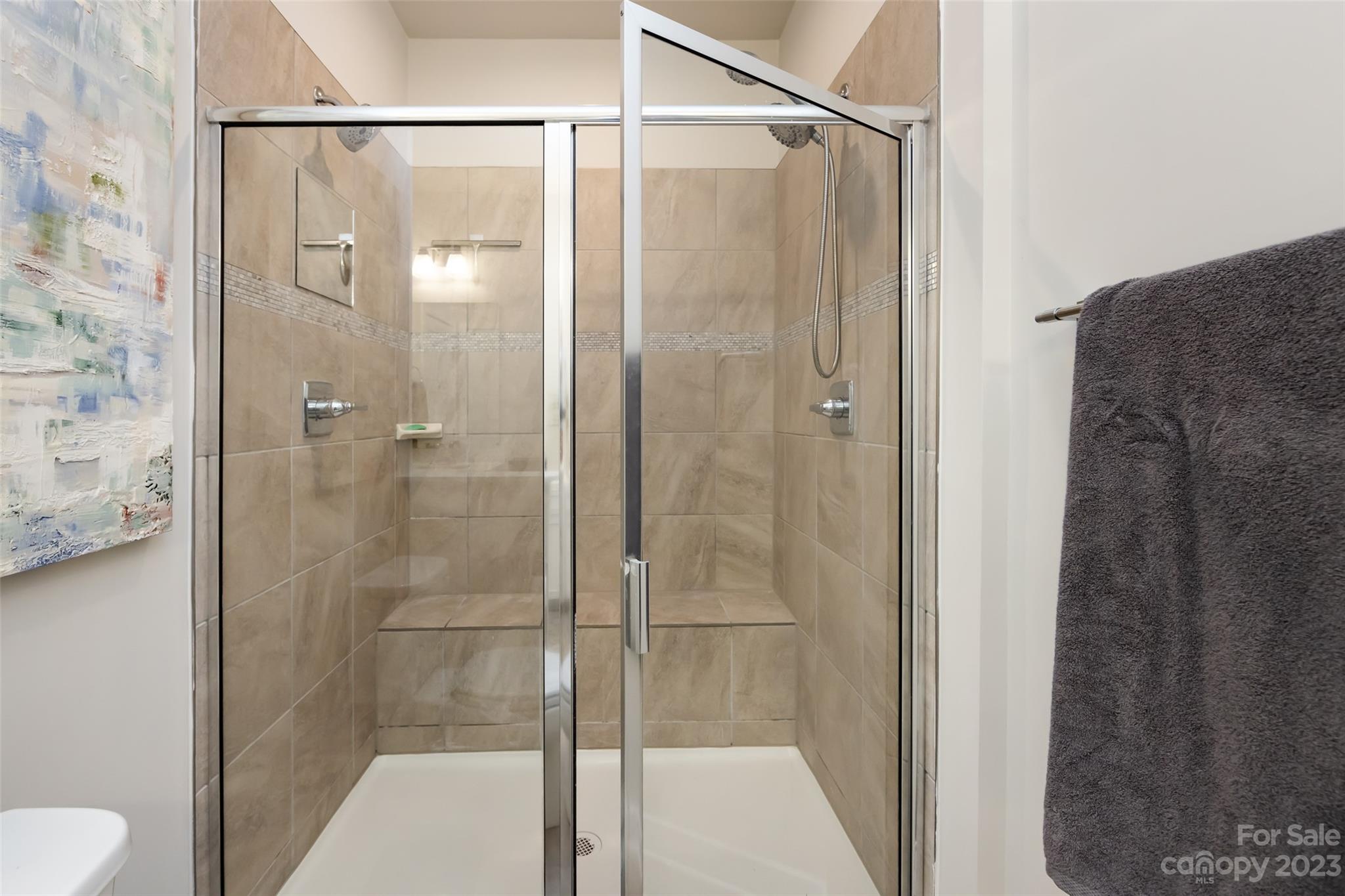 606 Crudent Road Tega Cay, SC 29708 - Photo 30 of 47 a bathroom with a shower and a toilet