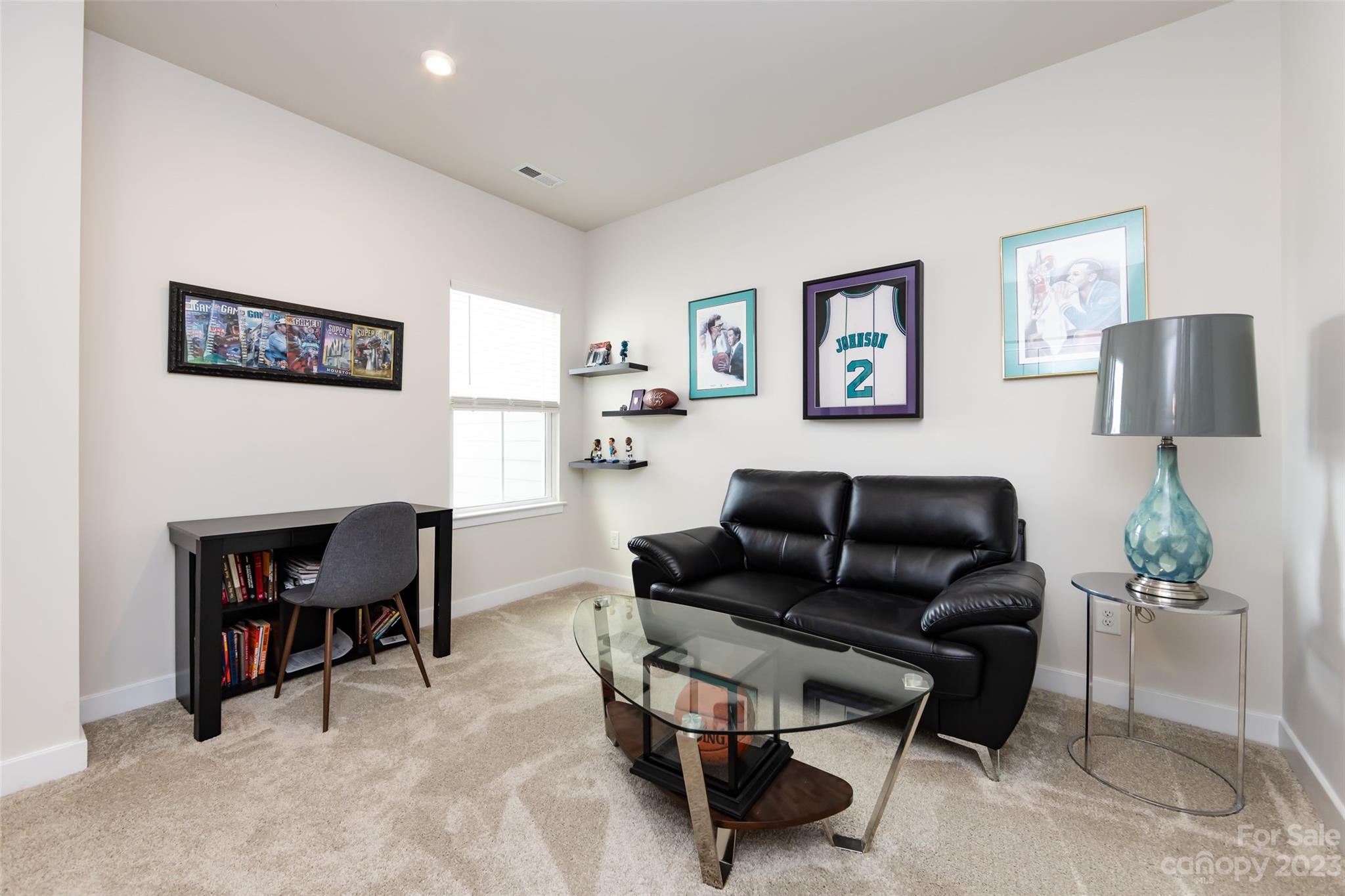 606 Crudent Road Tega Cay, SC 29708 - Photo 31 of 47 a living room with furniture and a fireplace