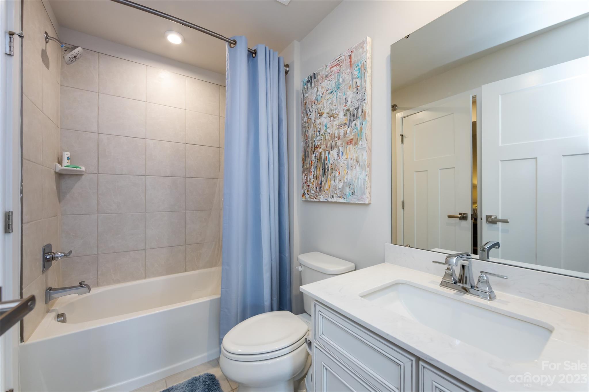 606 Crudent Road Tega Cay, SC 29708 - Photo 40 of 47 a bathroom with a sink a toilet and shower