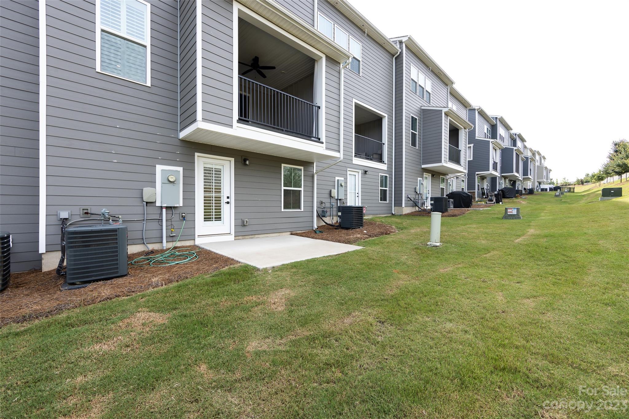 606 Crudent Road Tega Cay, SC 29708 - Photo 44 of 47 a view of a building with a swimming pool
