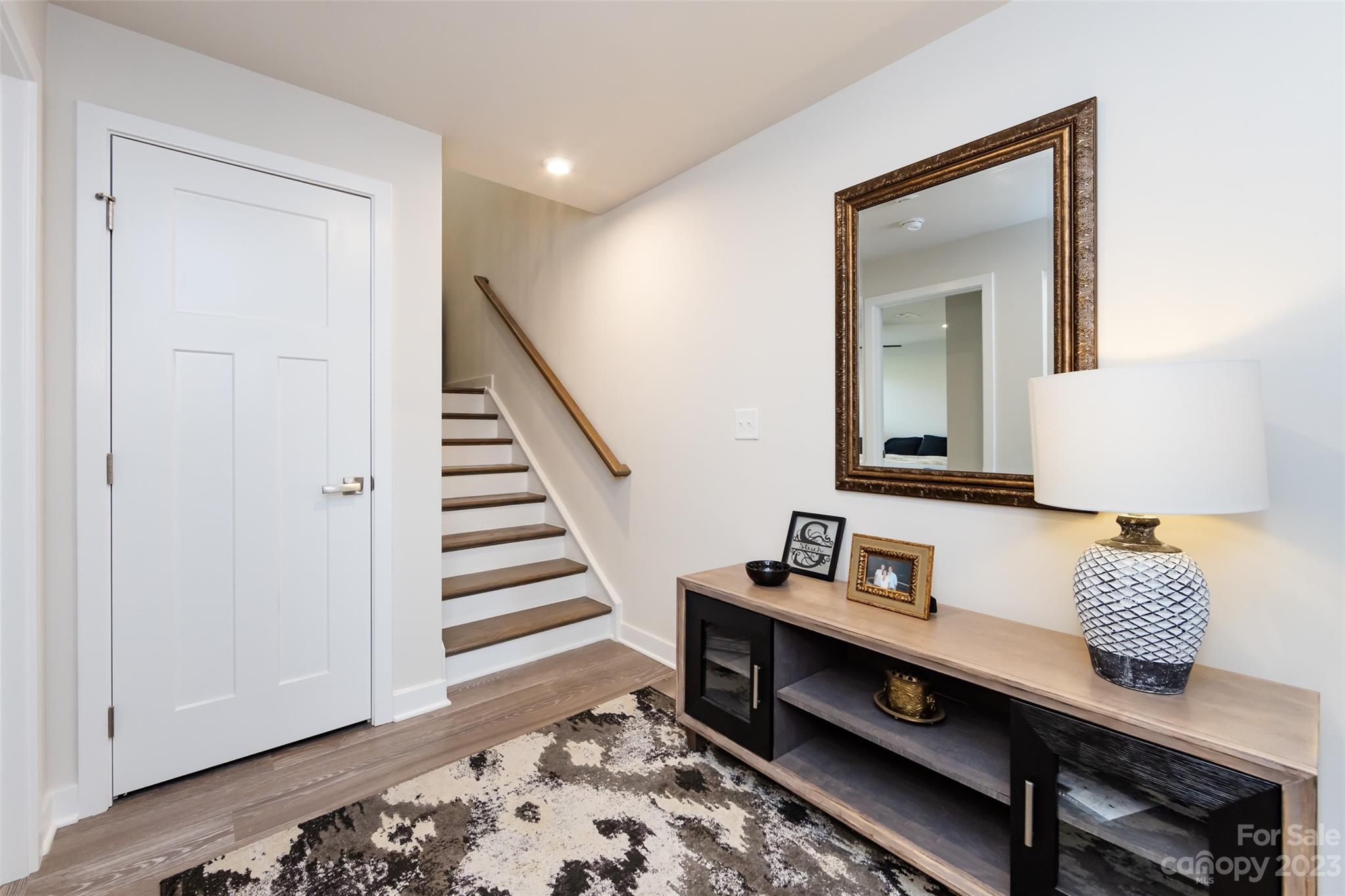 606 Crudent Road Tega Cay, SC 29708 - Photo 5 of 47 a room with furniture and wooden floor