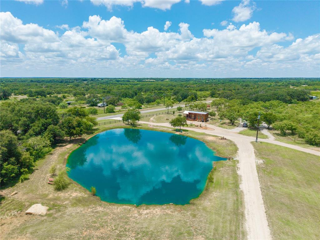 1010 Fm 583 Street West Rising Star, TX 76471 - Photo 5 of 40 a view of a swimming pool with a yard