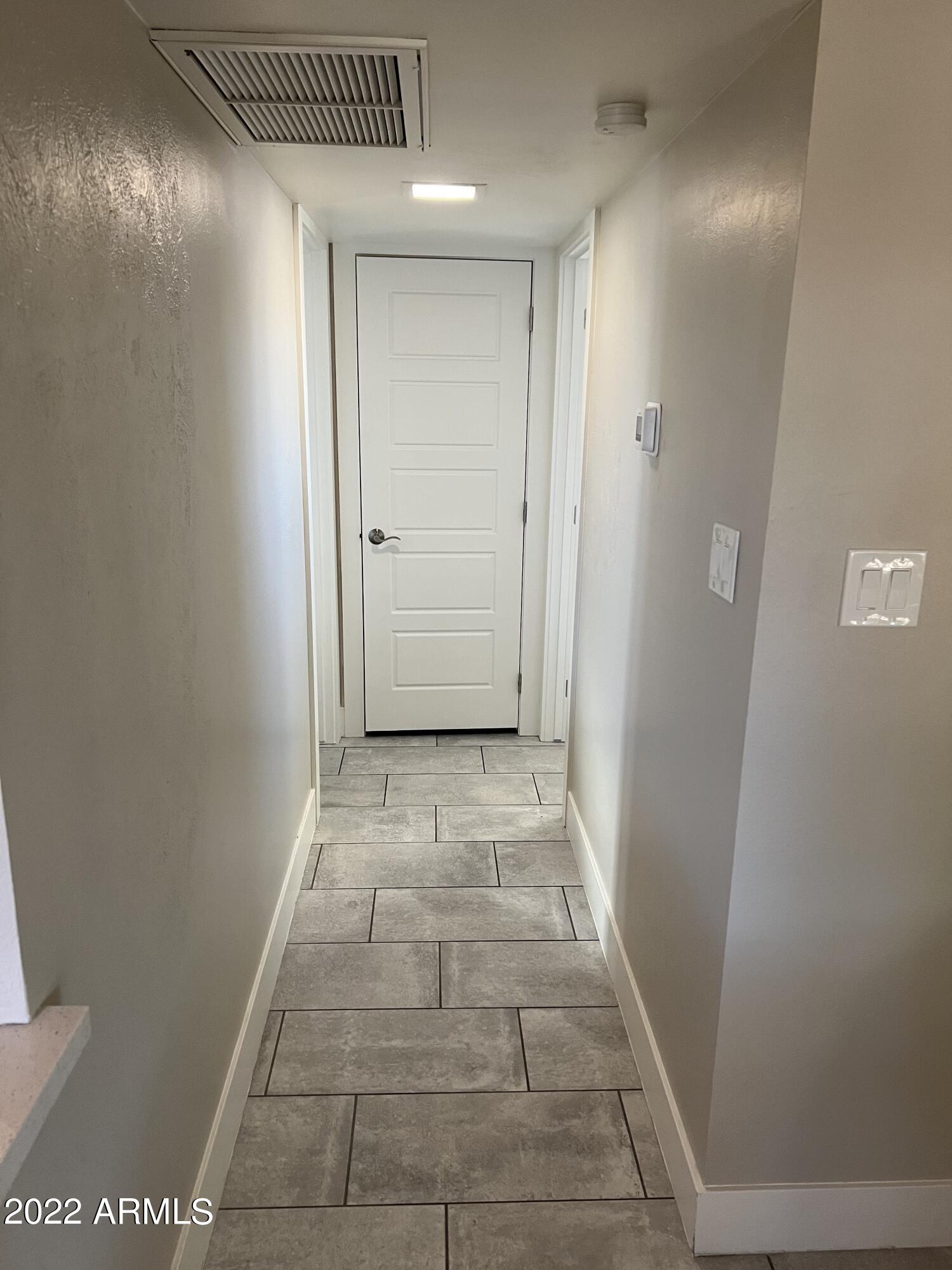 1250 East Bethany Home Road, Unit 17 Phoenix, AZ 85014 - Photo 14 of 25 a view of hallway