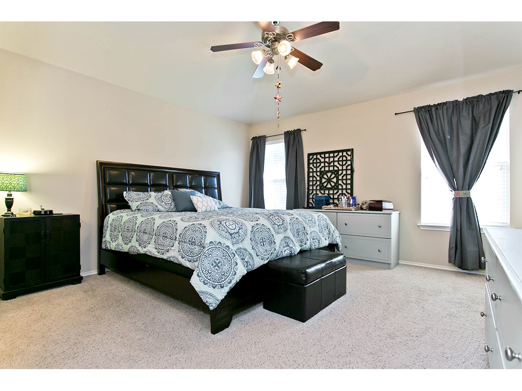 1808 Sand Creek Road Cedar Park, TX 78613 - Photo 20 of 25 Spacious room featuring neutral-toned walls and light-colored carpeting