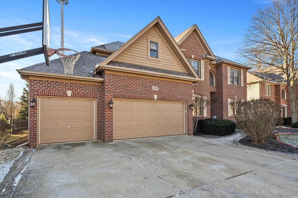 2197 Red Maple Lane Aurora, IL 60502 - Photo 1 of 48 a view of a house with a garage