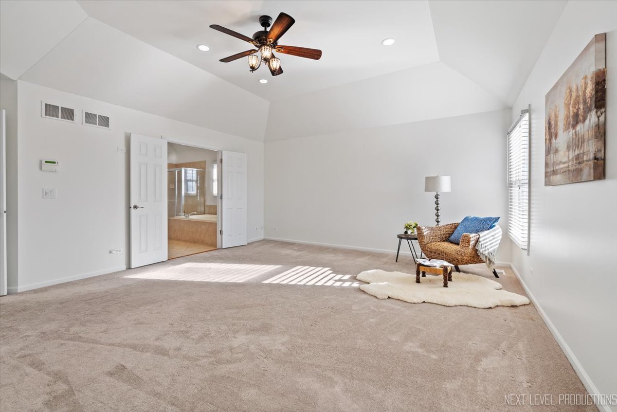 2197 Red Maple Lane Aurora, IL 60502 - Photo 21 of 48 a bedroom with a bed and chair