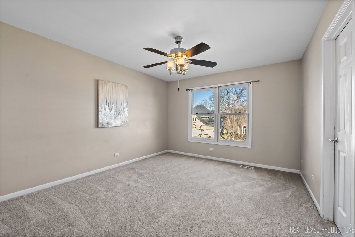 2197 Red Maple Lane Aurora, IL 60502 - Photo 26 of 48 a view of an empty room with a window