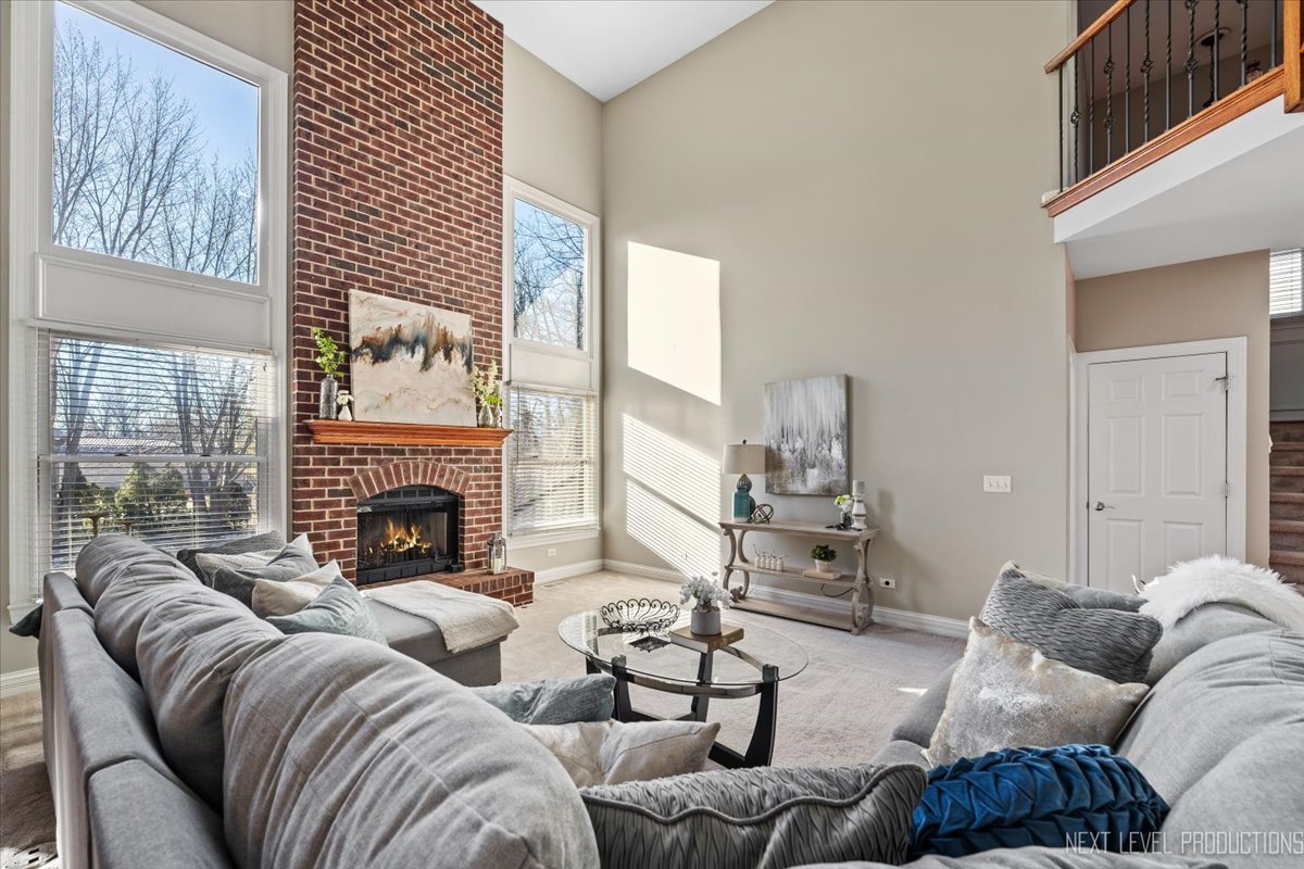 2197 Red Maple Lane Aurora, IL 60502 - Photo 39 of 48 a living room with furniture or fireplace and a large window