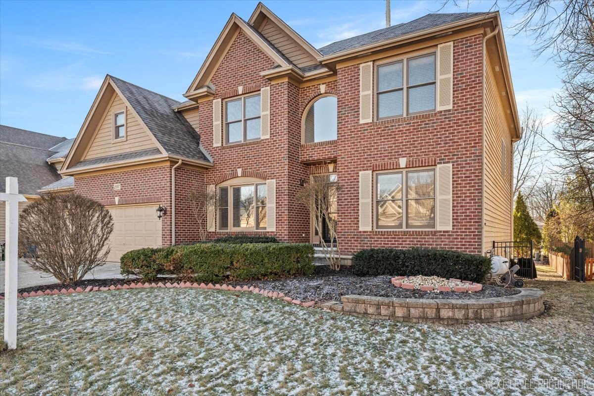 2197 Red Maple Lane Aurora, IL 60502 - Photo 48 of 48 a front view of a house with garden