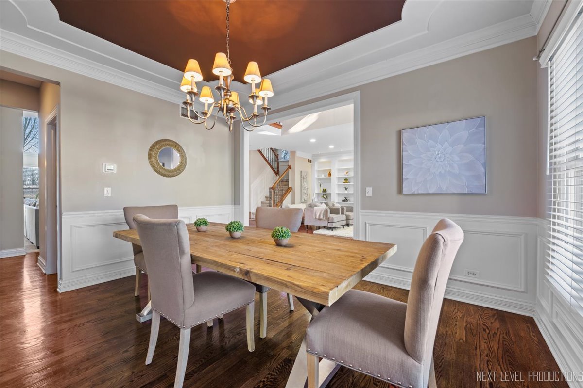 2197 Red Maple Lane Aurora, IL 60502 - Photo 6 of 48 a view of a dining room with furniture and wooden floor