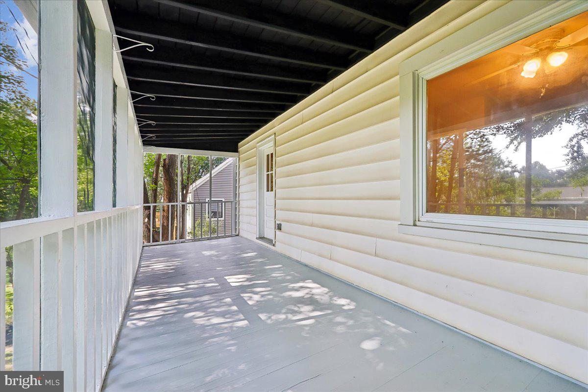 10404 Amherst Avenue Silver Spring, MD 20902 - Photo 32 of 49 Screened deck- rear of home