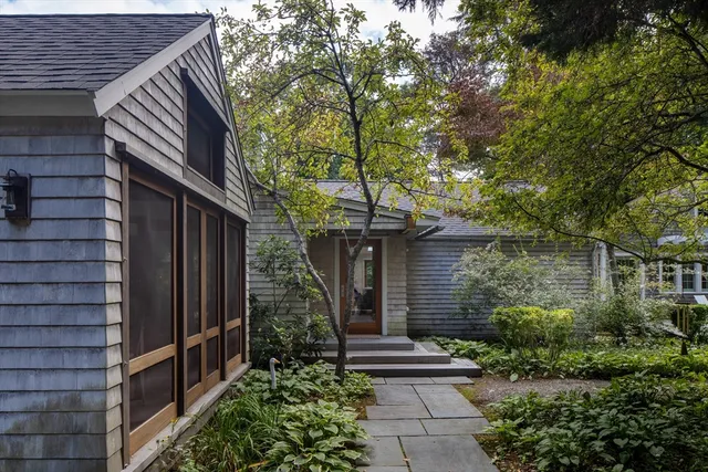a backyard of a house with lots of green space