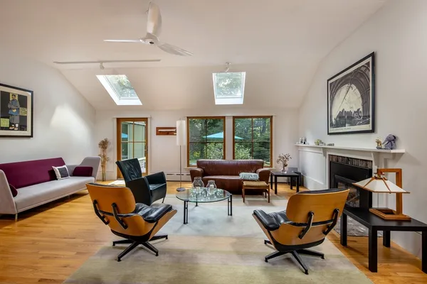 a living room with furniture or fireplace and a window