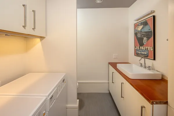 a utility room with dryer and washer