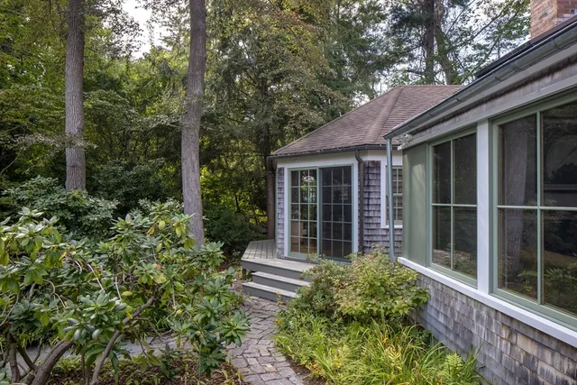 a house with trees in front of it