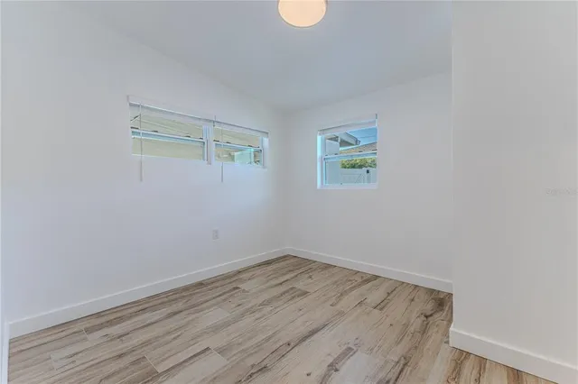 a view of a balcony with chairs