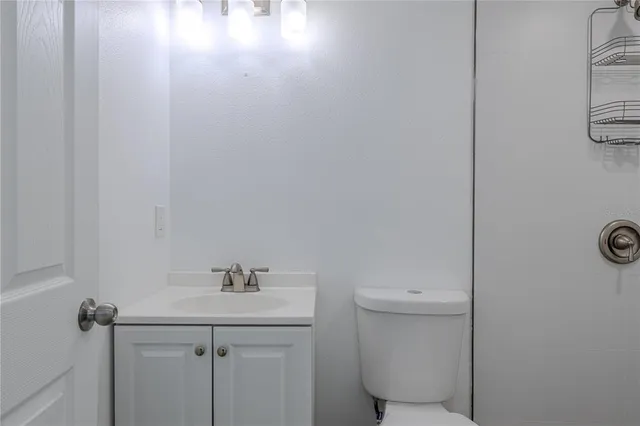 a view of a backyard with swimming pool