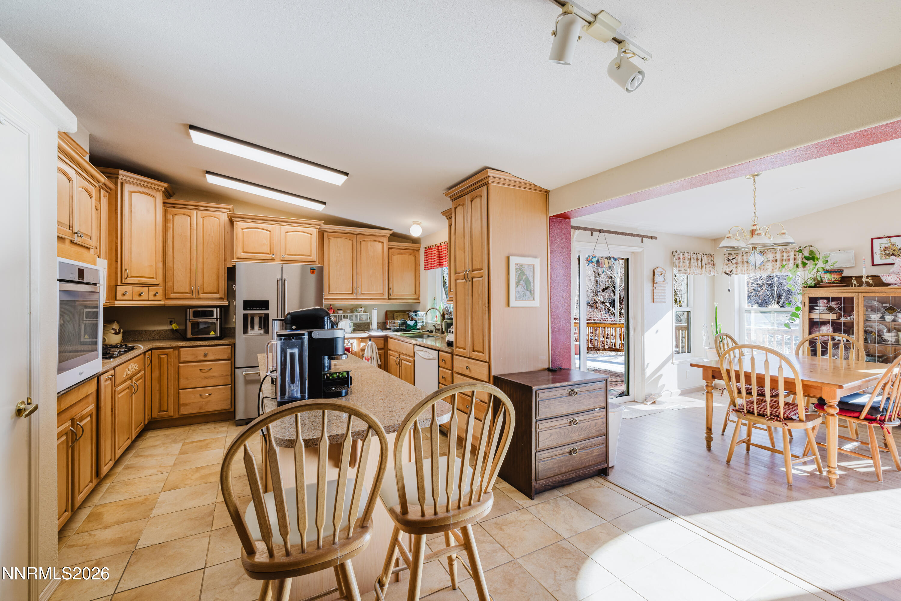 2013 Blume Ranch Road Lamoille, NV 89828 - Photo 14 of 37 a living room with lots of furniture wooden floor and a chandelier