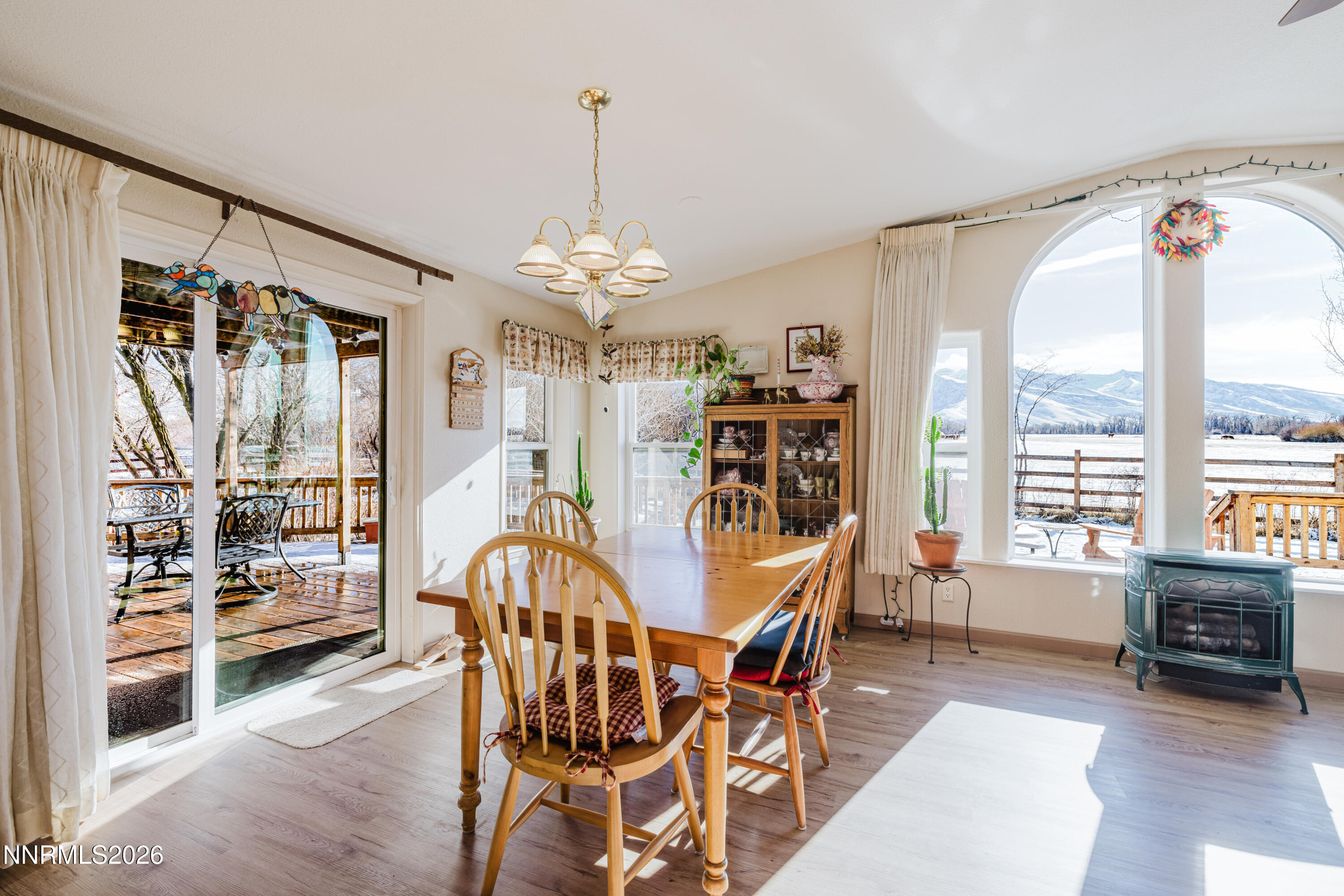 2013 Blume Ranch Road Lamoille, NV 89828 - Photo 16 of 37 a view of a dining room with furniture window and wooden floor