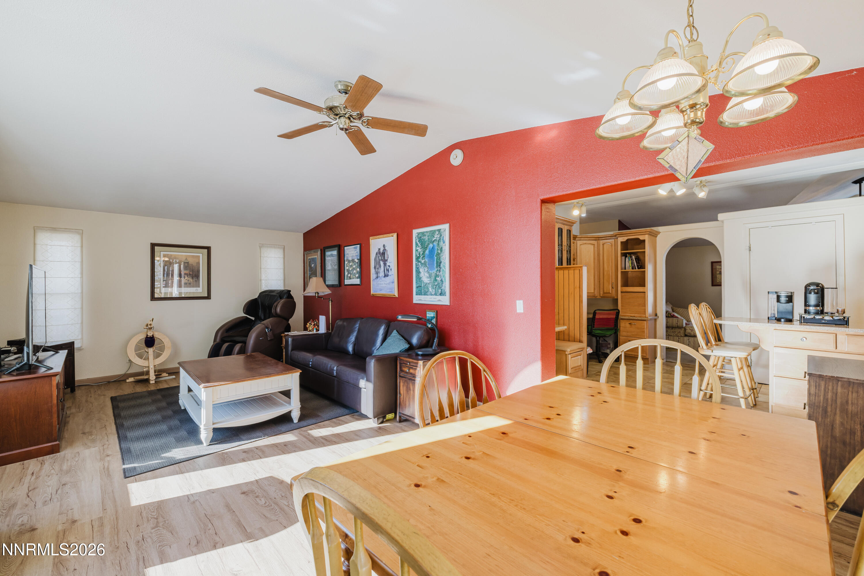 2013 Blume Ranch Road Lamoille, NV 89828 - Photo 17 of 37 a living room with furniture a chandelier and a dining table