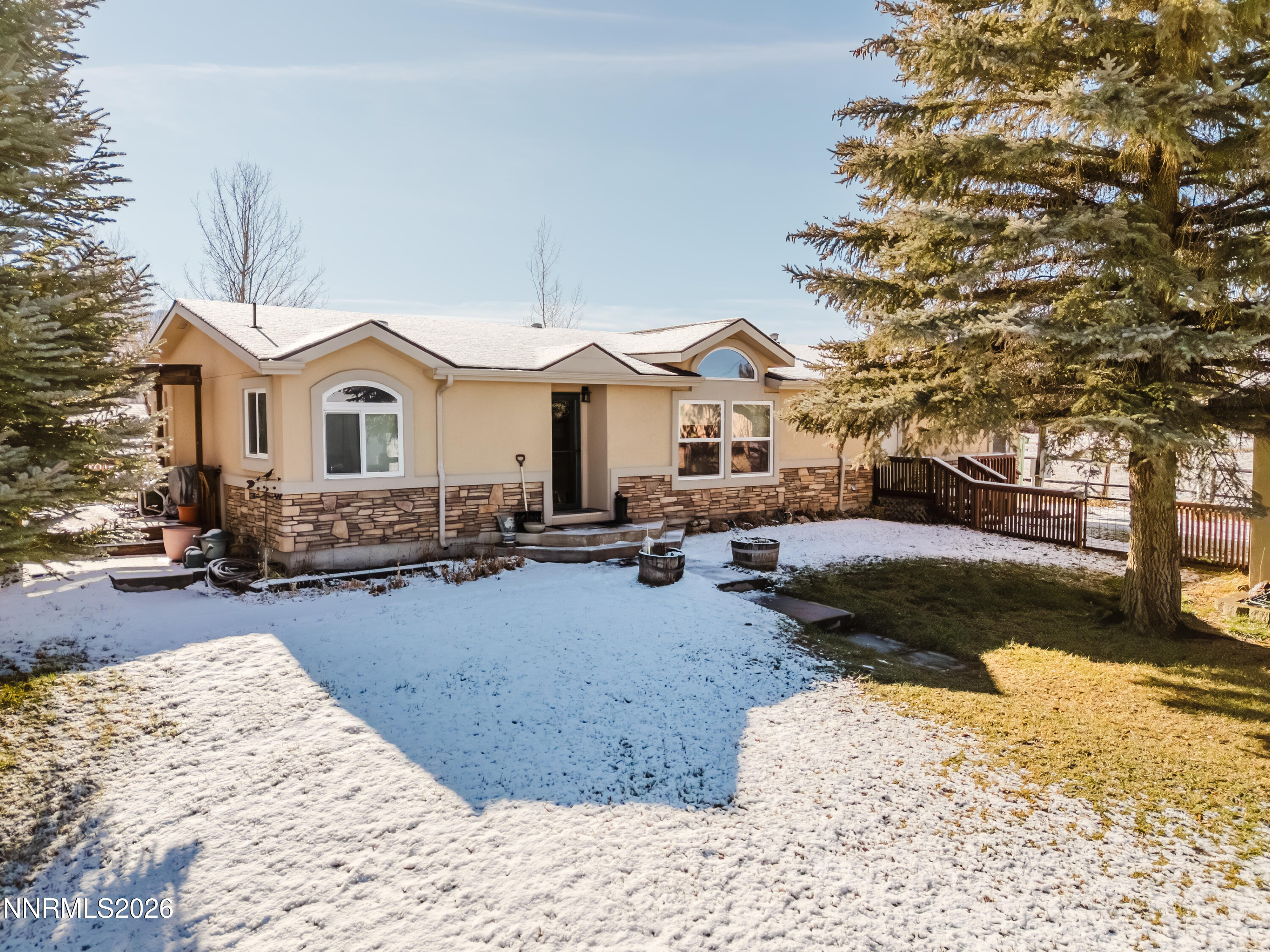 2013 Blume Ranch Road Lamoille, NV 89828 - Photo 2 of 37 a view of a house with a yard covered in snow