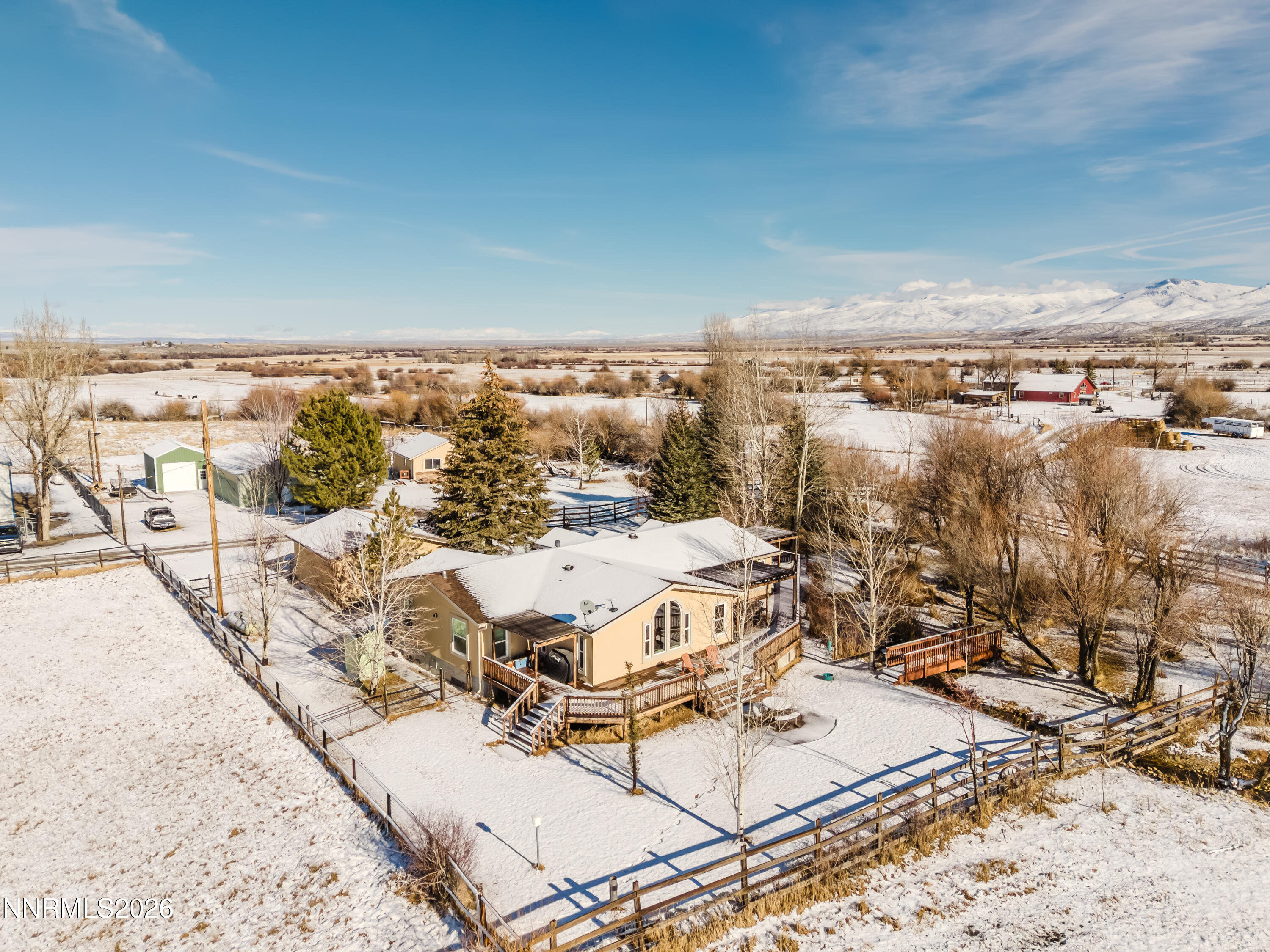 2013 Blume Ranch Road Lamoille, NV 89828 - Photo 4 of 37 a view of a terrace with wooden benches