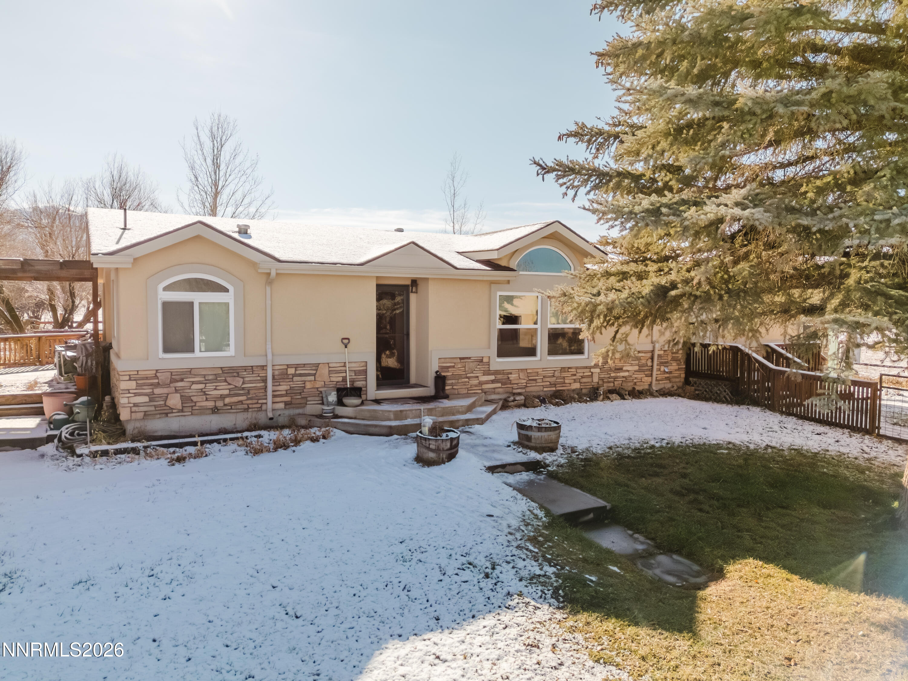 2013 Blume Ranch Road Lamoille, NV 89828 - Photo 10 of 37 a front view of a house with garden
