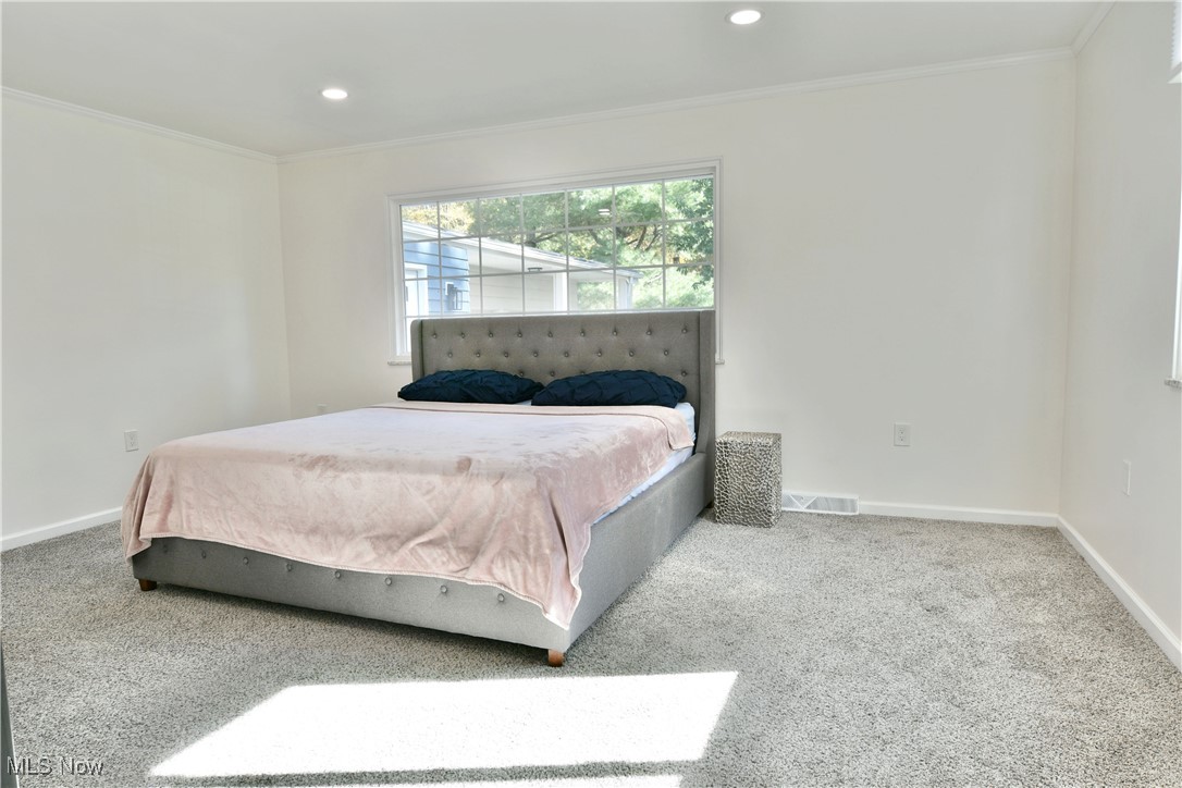 9633 Howland Springs Road Southeast Warren, OH 44484 - Photo 25 of 50 Carpeted bedroom featuring ornamental molding and recessed lighting