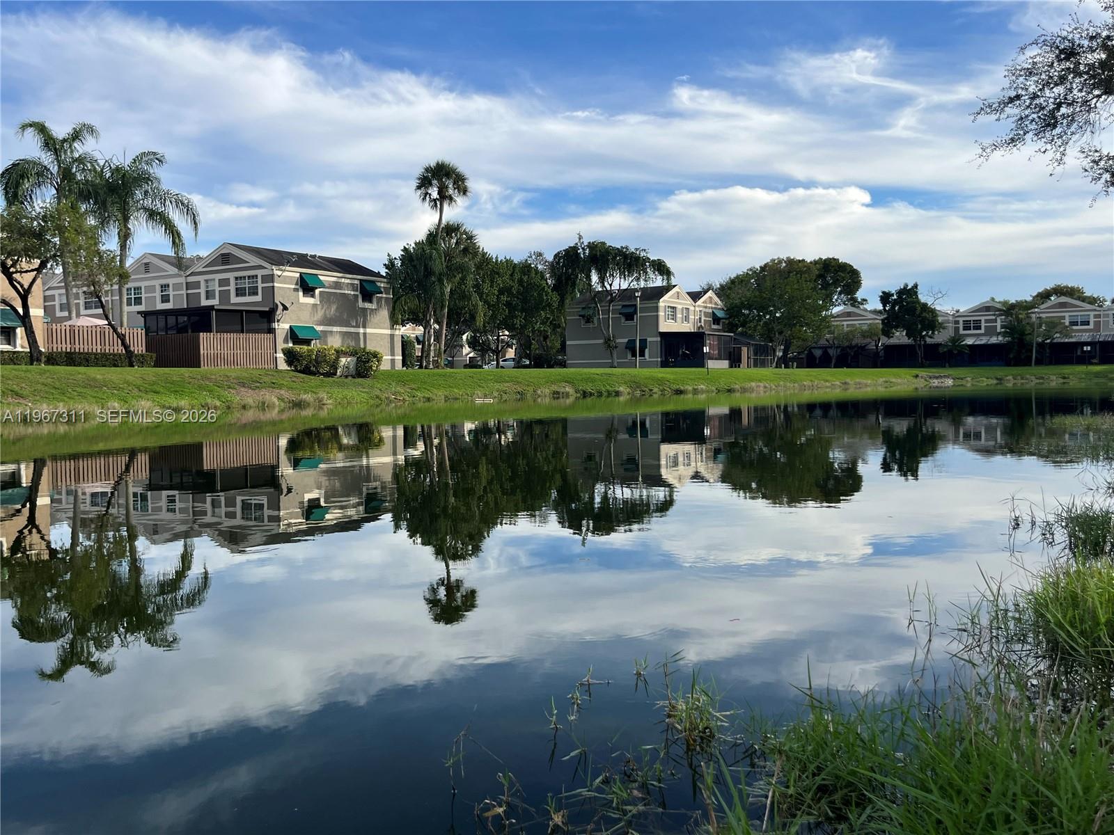 5150 Lake Loop Road Cooper City, FL 33330 - Photo 1 of 22 an outdoor view of a lake view