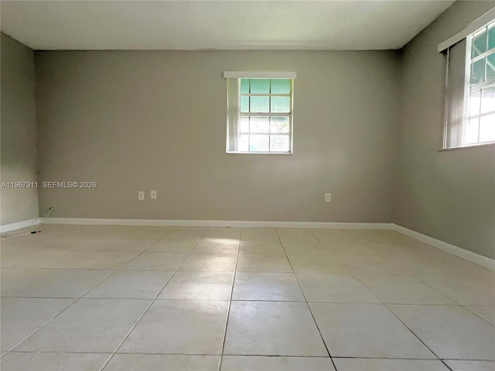 5150 Lake Loop Road Cooper City, FL 33330 - Photo 20 of 22 a view of an empty room with a window