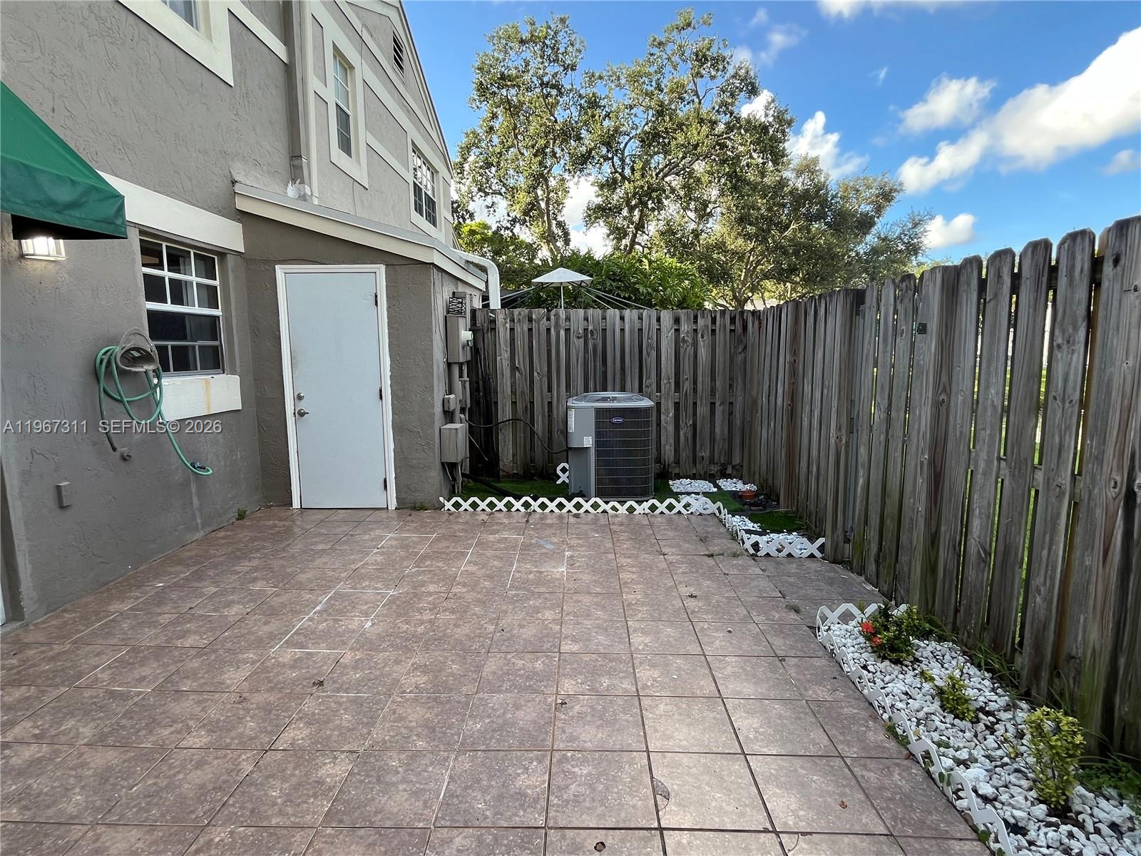 5150 Lake Loop Road Cooper City, FL 33330 - Photo 4 of 22 a view of backyard space