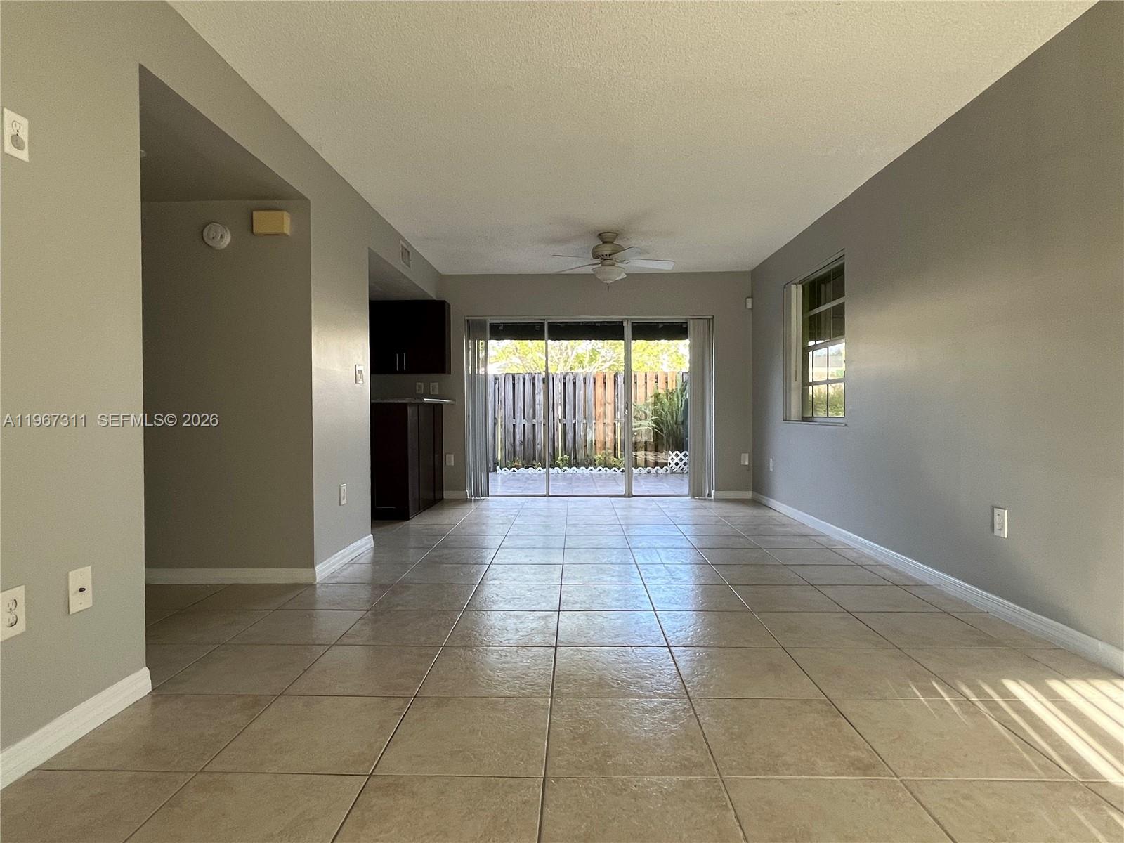 5150 Lake Loop Road Cooper City, FL 33330 - Photo 5 of 22 a view of an empty room and window