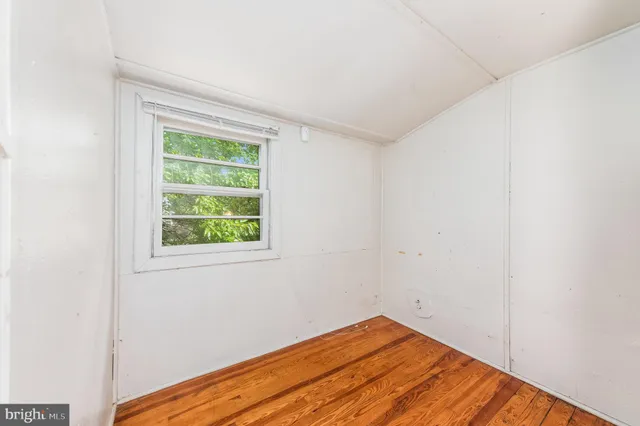 an empty room with window