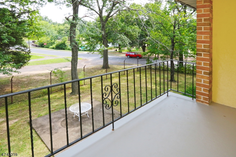 2 Westervelt Place, Unit C203 Clifton, NJ 07011 - Photo 3 of 11 a view of balcony with mountain view