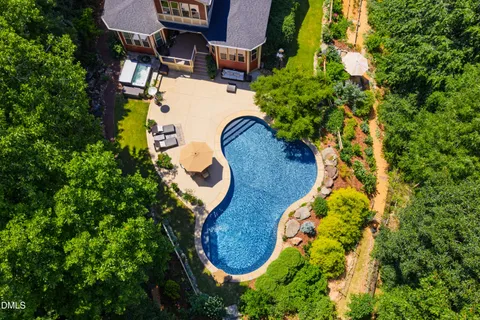 $975,000 | 212 Middlegreen Place, Holly Springs, NC 27540