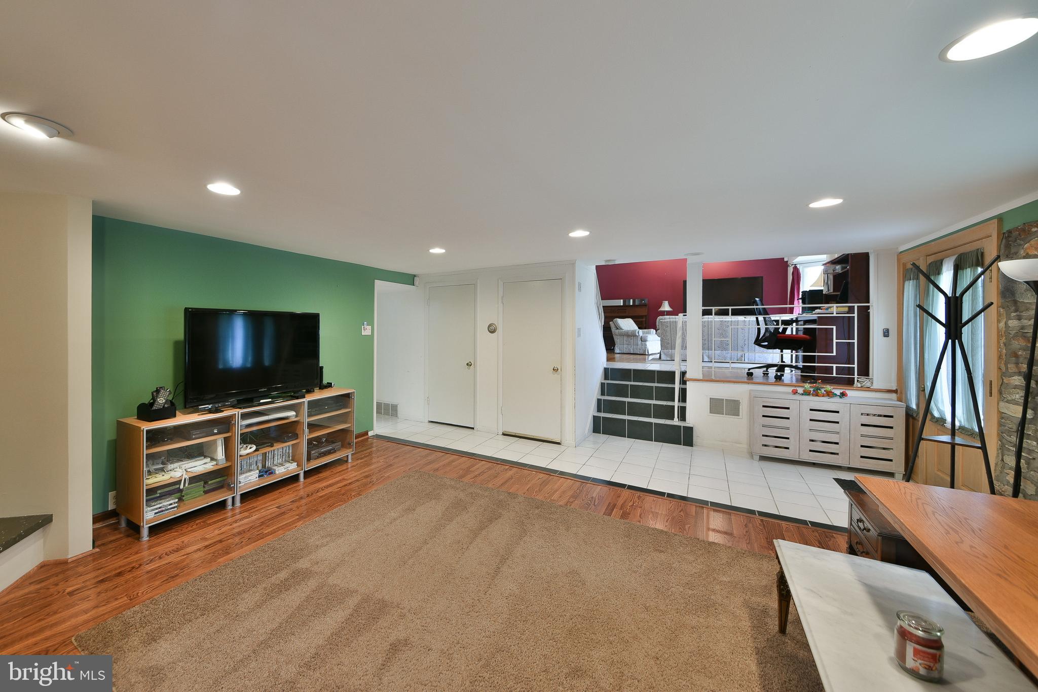 1035 Old Ford Road Huntingdon Valley, PA 19006 - Photo 16 of 39 a living room with furniture and a flat screen tv