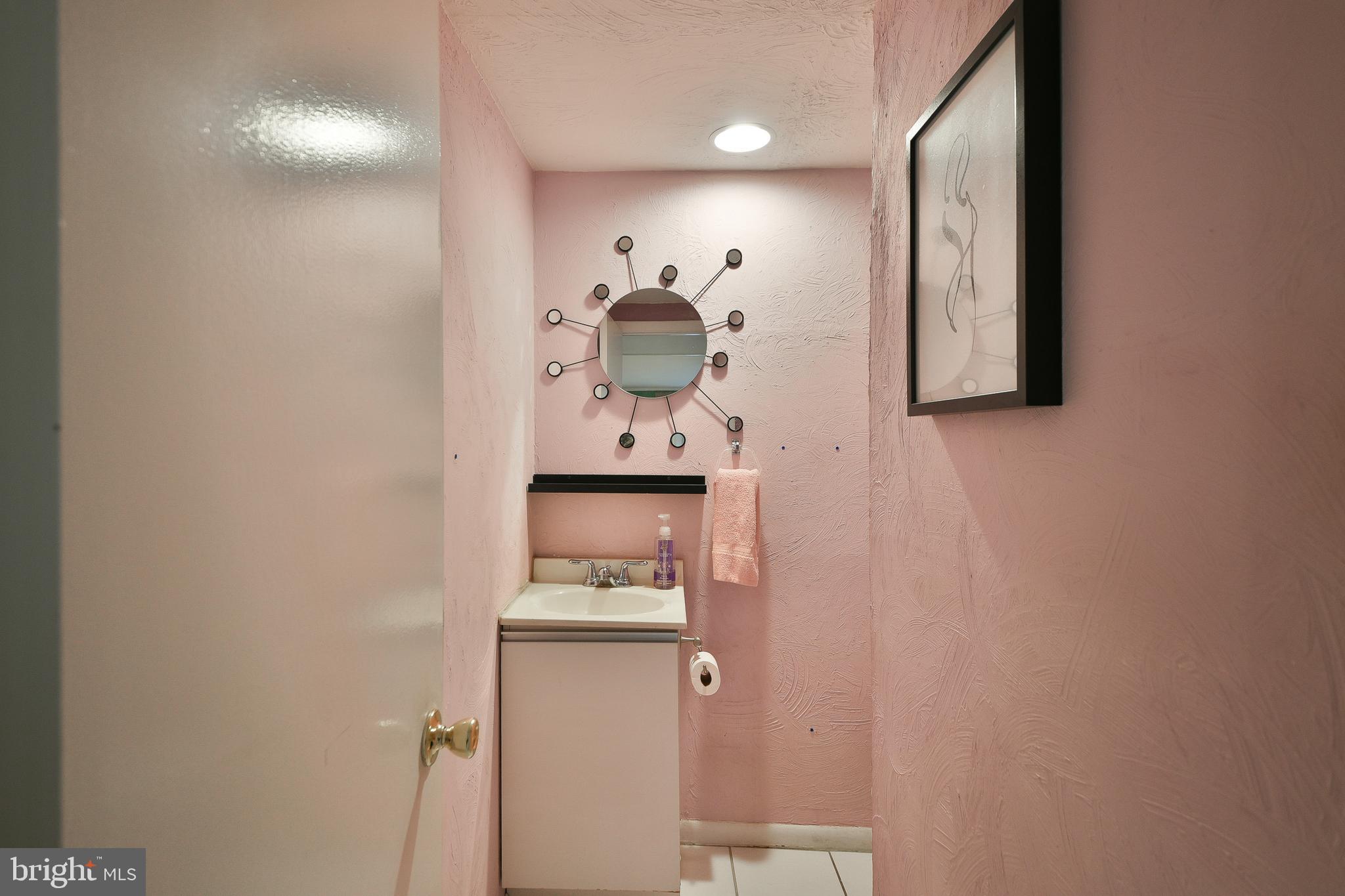 1035 Old Ford Road Huntingdon Valley, PA 19006 - Photo 17 of 39 a bathroom with a sink and mirror