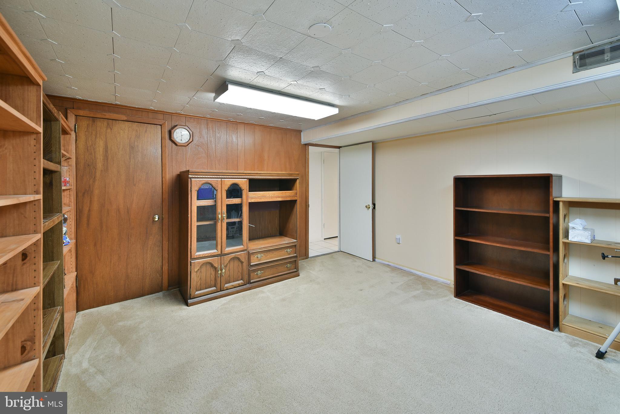 1035 Old Ford Road Huntingdon Valley, PA 19006 - Photo 18 of 39 a view of an empty room with cabinet and a window