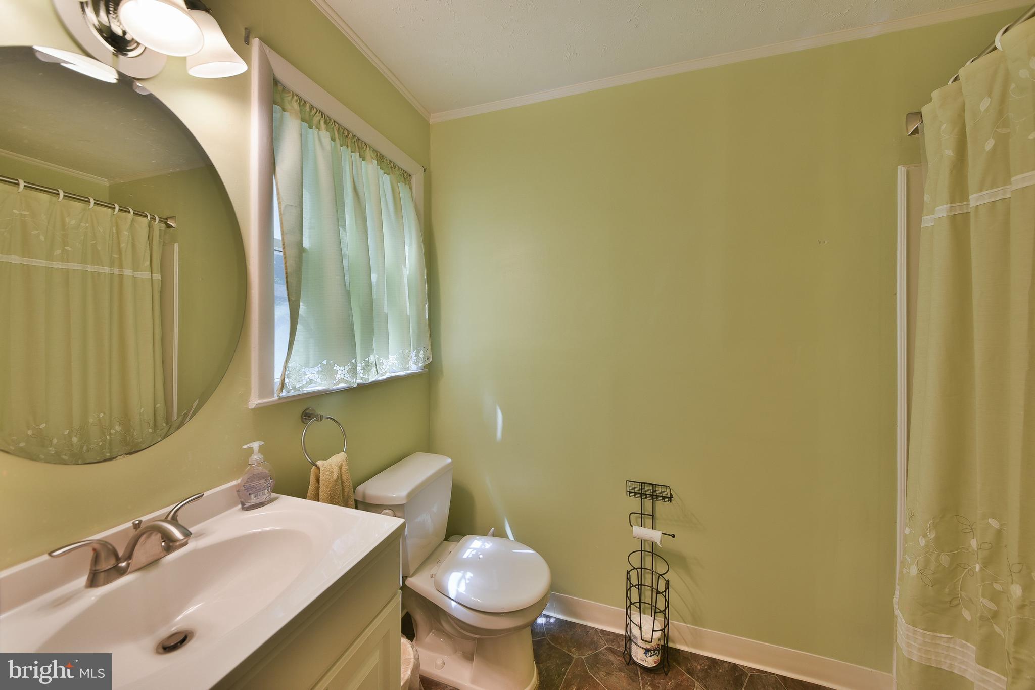 1035 Old Ford Road Huntingdon Valley, PA 19006 - Photo 22 of 39 a bathroom with a sink and a mirror