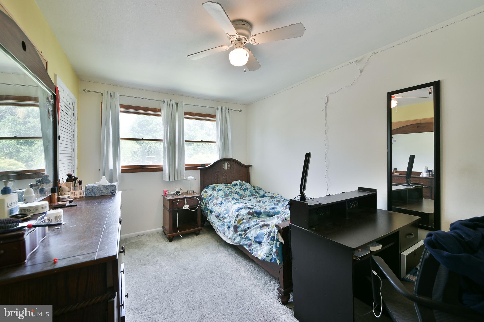 1035 Old Ford Road Huntingdon Valley, PA 19006 - Photo 25 of 39 a bedroom with bed and a large window