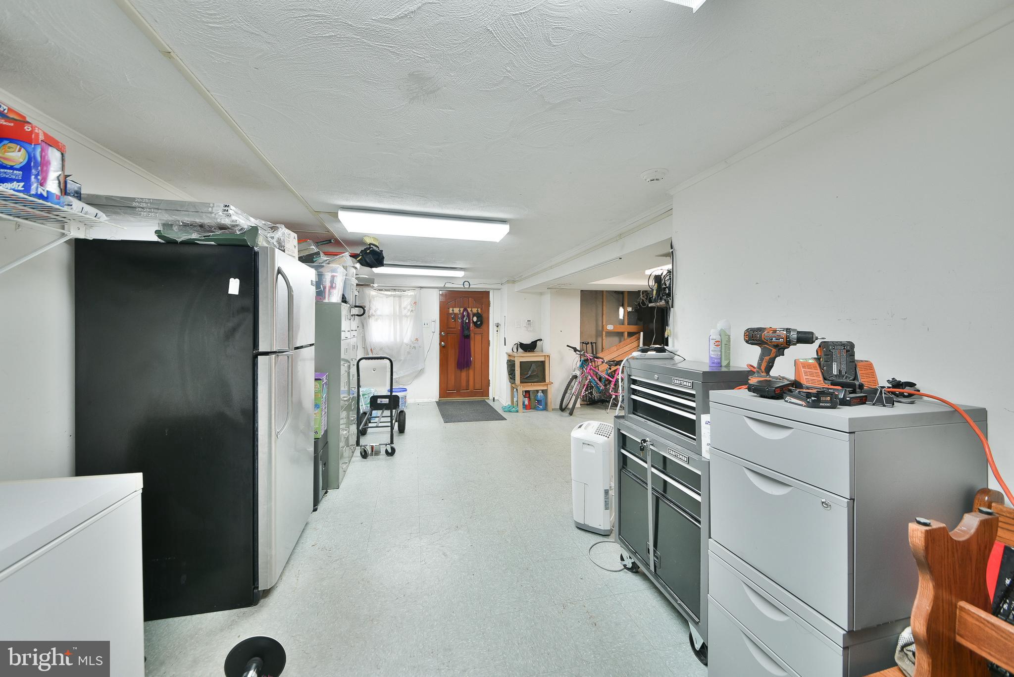 1035 Old Ford Road Huntingdon Valley, PA 19006 - Photo 30 of 39 a kitchen with a refrigerator and a stove