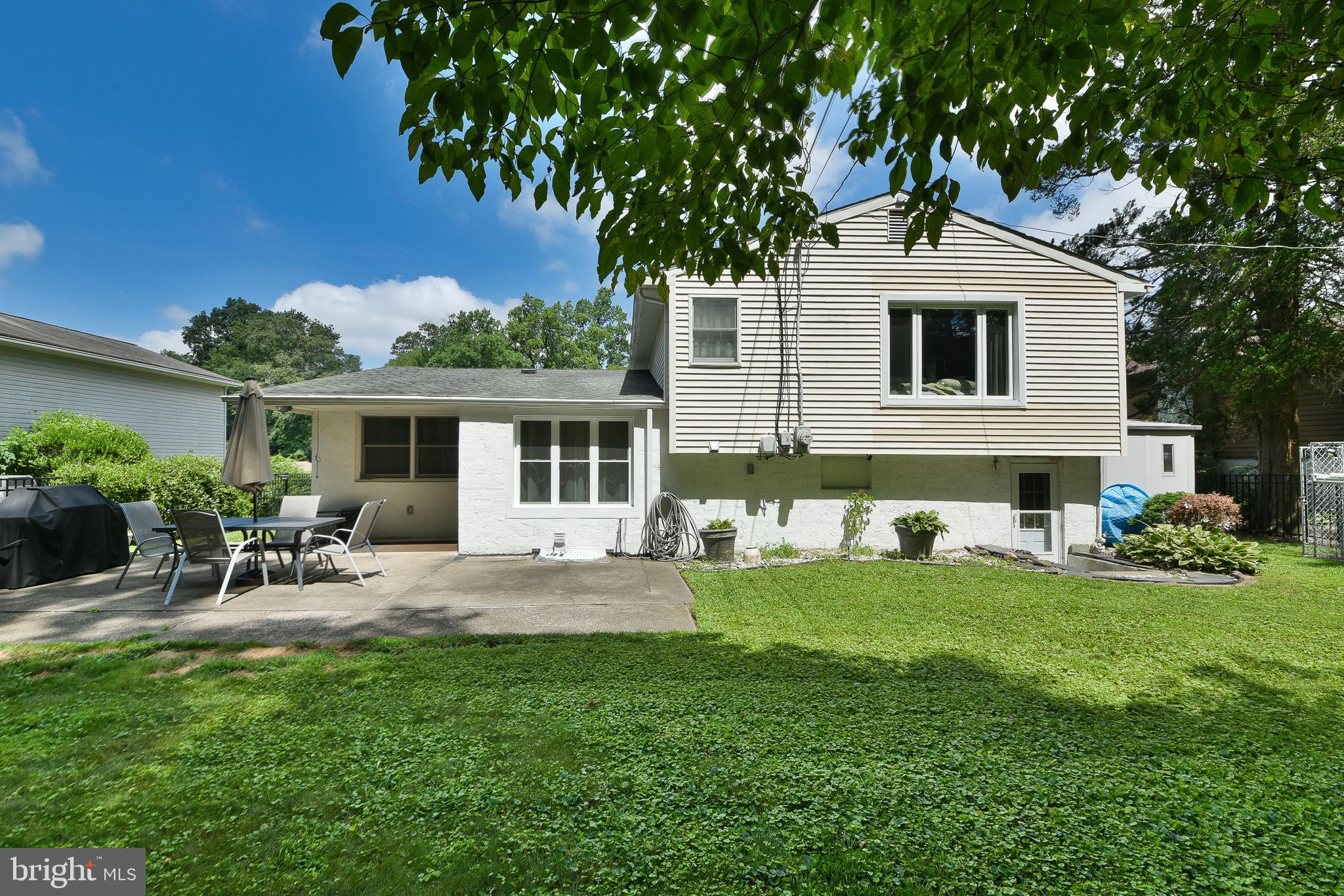 1035 Old Ford Road Huntingdon Valley, PA 19006 - Photo 34 of 39 a view of a house with a yard and sitting area